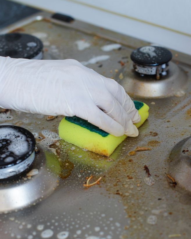 Commercial kitchen being professionally cleaned